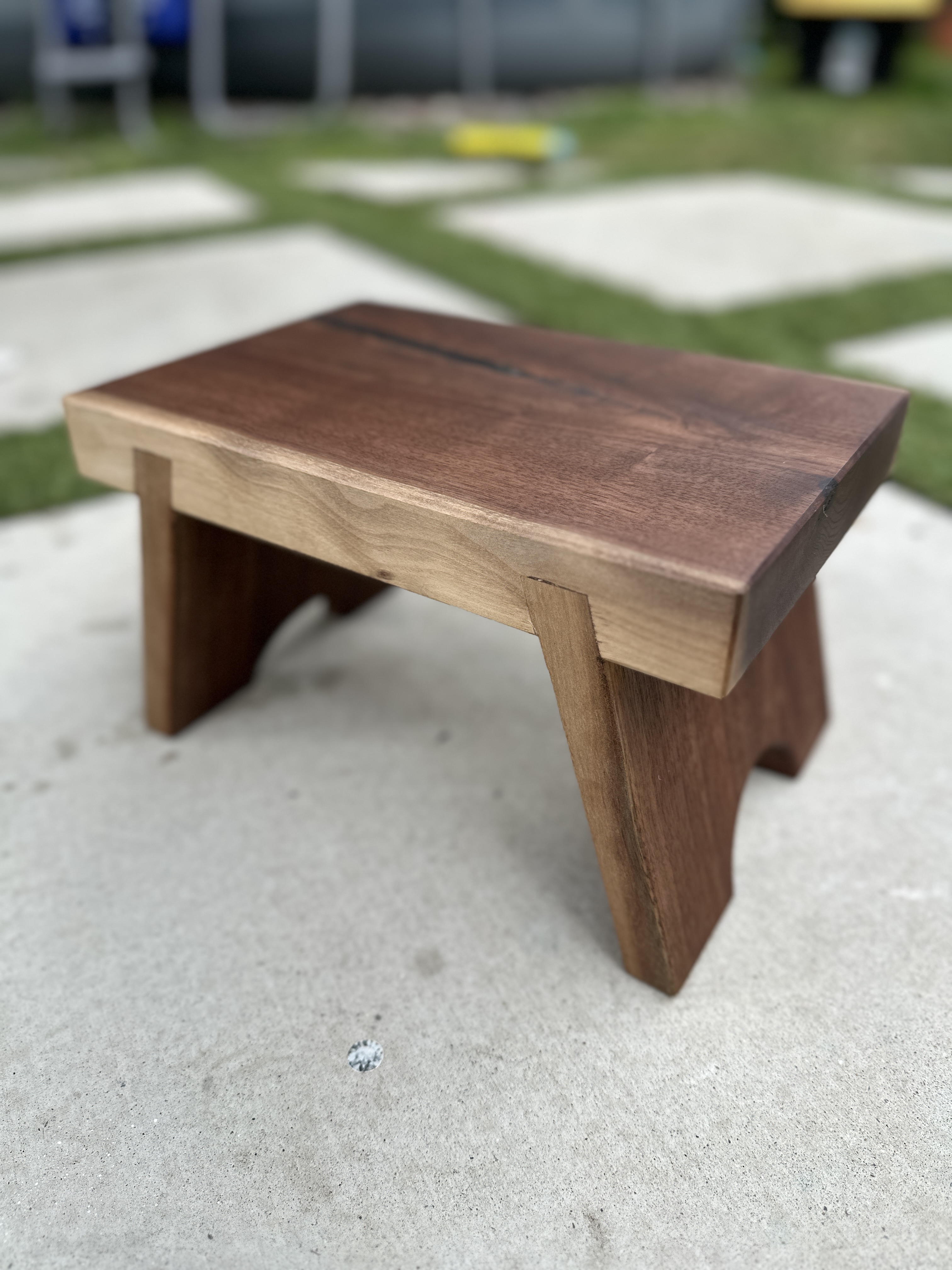 Solid walnut stool - front view