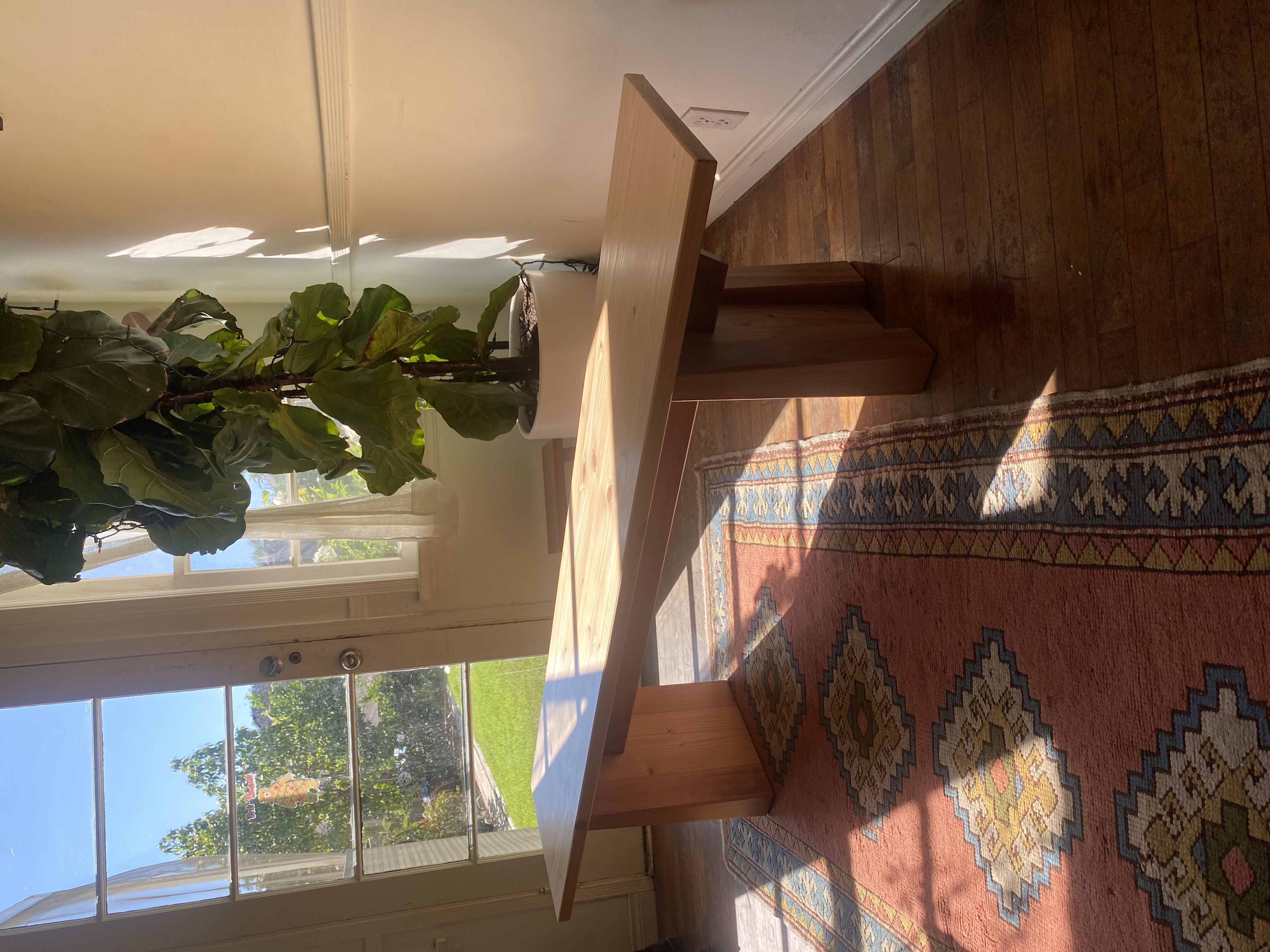 Cedar entryway bench - side angle by window