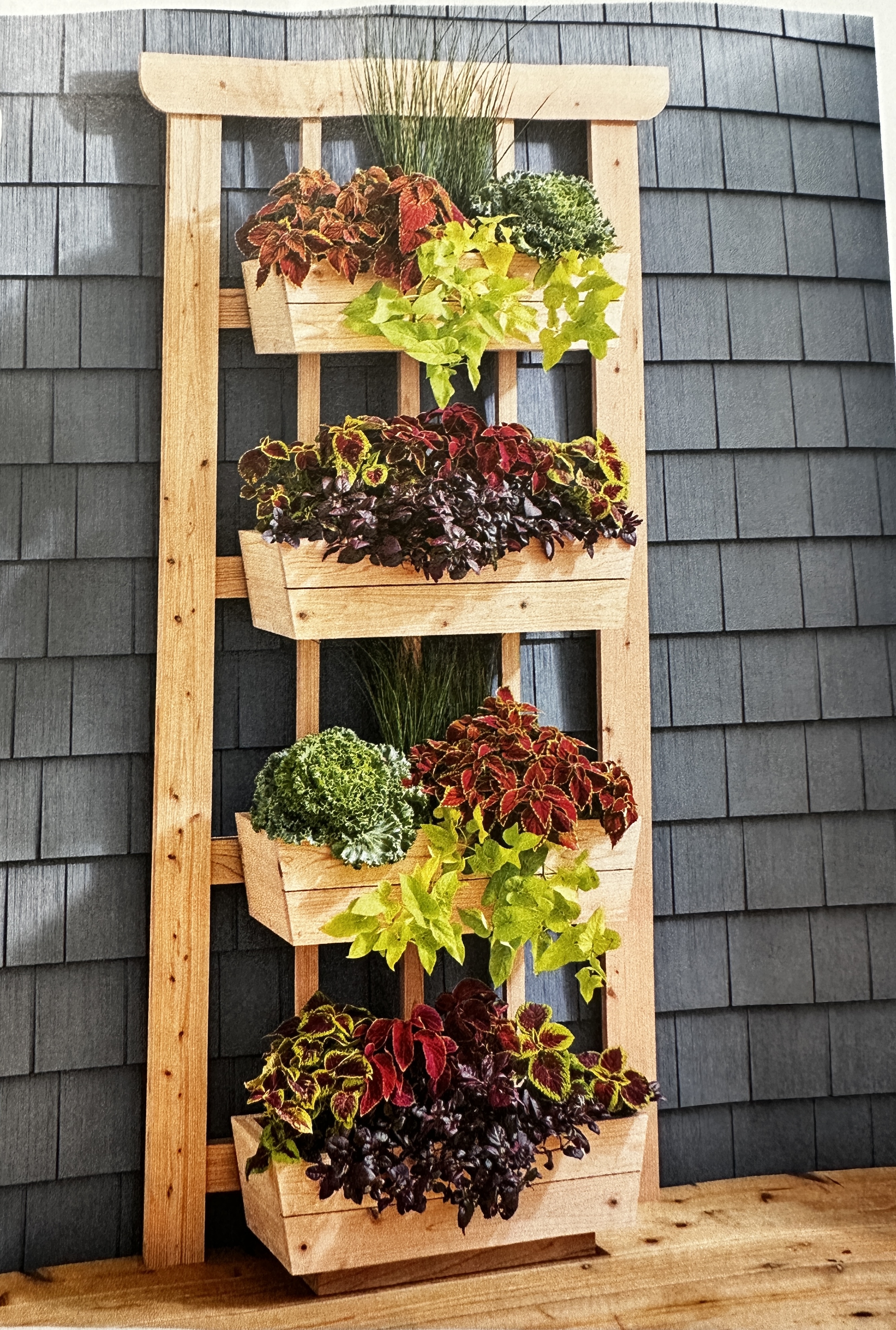 Space saving vertical garden planter with four tiers